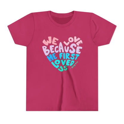 Youth Tee — "We Love Because He First Loved Us" Heart Design