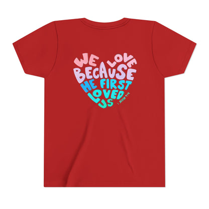 Youth Tee — "We Love Because He First Loved Us" Heart Design