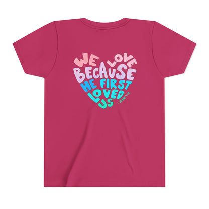 Youth Tee — "We Love Because He First Loved Us" Heart Design